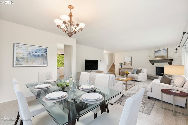 12370 SW 121st Ave, Tigard, OR 97223 - dining space featuring stairs, a fireplace, and a chandelier