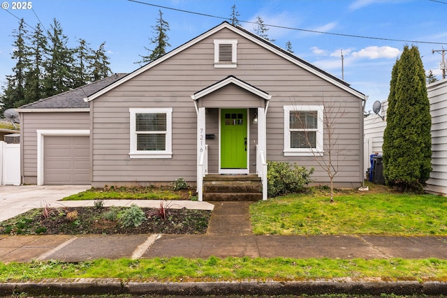 bungalow-style house featuring a garage and a front yard