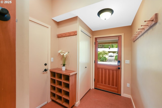 2634 SW Boundary St, Portland, OR 97239 - foyer featuring baseboards and light carpet