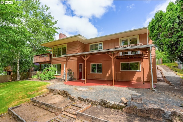2634 SW Boundary St, Portland, OR 97239 - back of house with a patio, a chimney, and a wooden deck