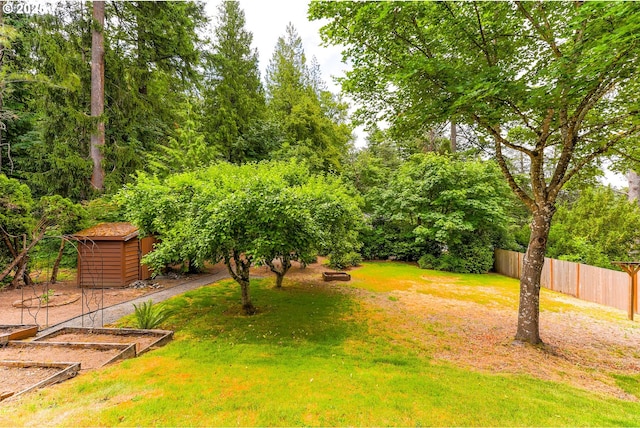 2634 SW Boundary St, Portland, OR 97239 - view of yard with a shed and a vegetable garden