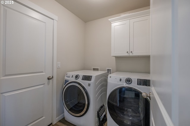 414 SE Ray St, Dallas, OR 97338 - laundry room featuring cabinet space and washer and clothes dryer