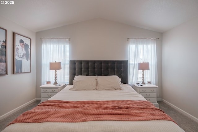 414 SE Ray St, Dallas, OR 97338 - bedroom featuring vaulted ceiling, dark carpet, baseboards, and multiple windows