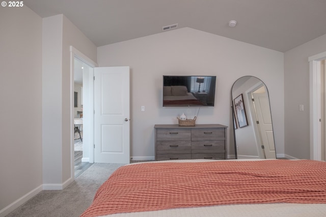 414 SE Ray St, Dallas, OR 97338 - bedroom with baseboards, light carpet, visible vents, and vaulted ceiling