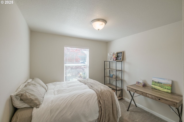 414 SE Ray St, Dallas, OR 97338 - carpeted bedroom with a textured ceiling and baseboards