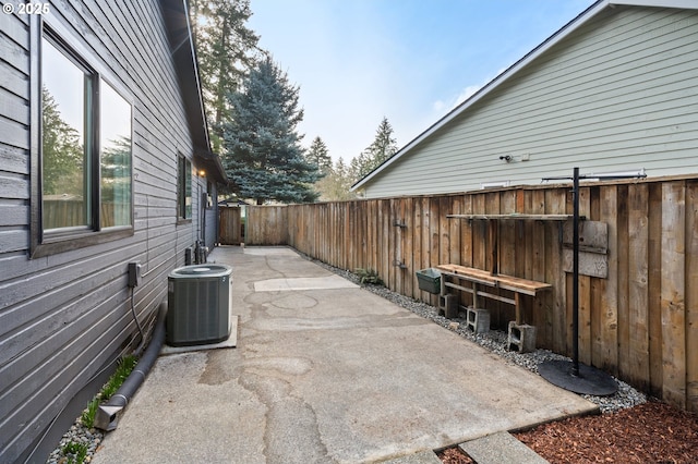 view of patio with central AC