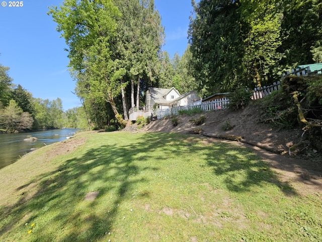 view of yard featuring a water view
