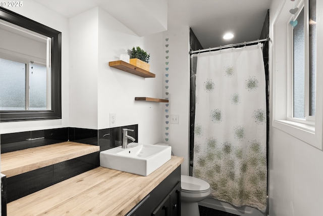 10951 SE Valley View Ter, Happy Valley, OR 97086 - bathroom with vanity, toilet, and a shower with curtain