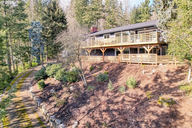 10951 SE Valley View Ter, Happy Valley, OR 97086 - rear view of property with a wooden deck and a chimney