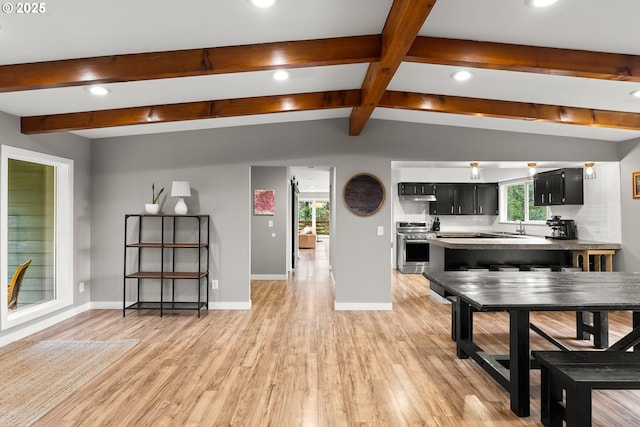 10951 SE Valley View Ter, Happy Valley, OR 97086 - dining room featuring recessed lighting, healthy amount of natural light, light wood finished floors, and baseboards