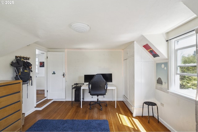 office space featuring hardwood / wood-style flooring and baseboards
