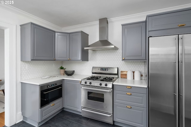 3321 NE 13th Ave, Portland, OR 97212 - kitchen featuring appliances with stainless steel finishes, wall chimney exhaust hood, gray cabinets, and crown molding