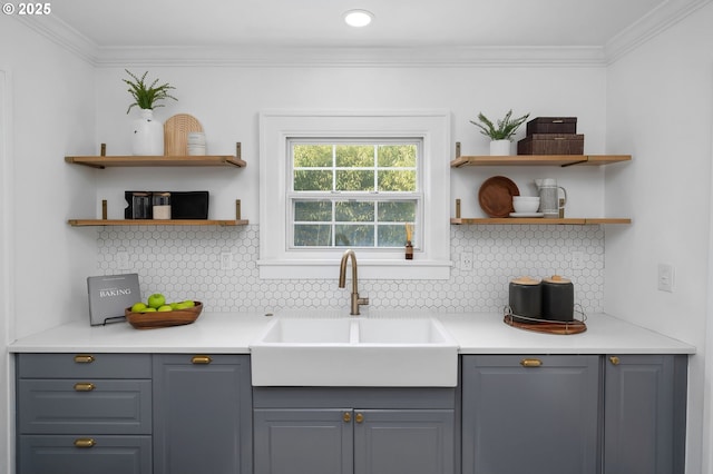 3321 NE 13th Ave, Portland, OR 97212 - kitchen featuring open shelves, a sink, gray cabinets, decorative backsplash, and ornamental molding