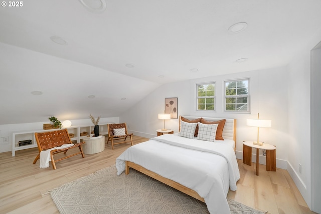 3321 NE 13th Ave, Portland, OR 97212 - bedroom featuring light wood-style flooring, lofted ceiling, and baseboards