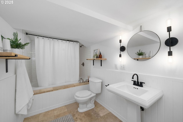 3321 NE 13th Ave, Portland, OR 97212 - full bathroom featuring tiled shower / bath, toilet, and wainscoting
