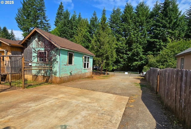49626 High Prairie Loop, Oakridge, OR 97463 - view of side of property featuring a patio area