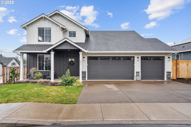 view of front of property featuring a shingled roof, an attached garage, board and batten siding, fence, and driveway