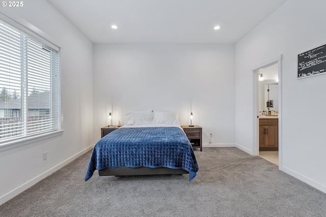 bedroom featuring ensuite bathroom, recessed lighting, carpet flooring, and baseboards