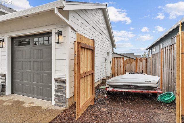 garage with fence