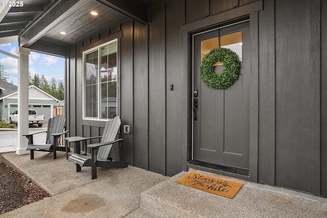 doorway to property with board and batten siding