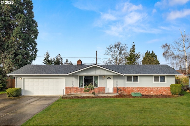 single story home with a front yard, a chimney, concrete driveway, a garage, and brick siding