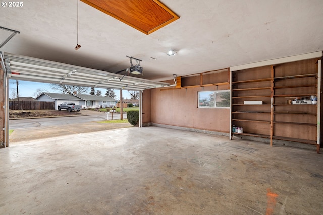 garage featuring a garage door opener