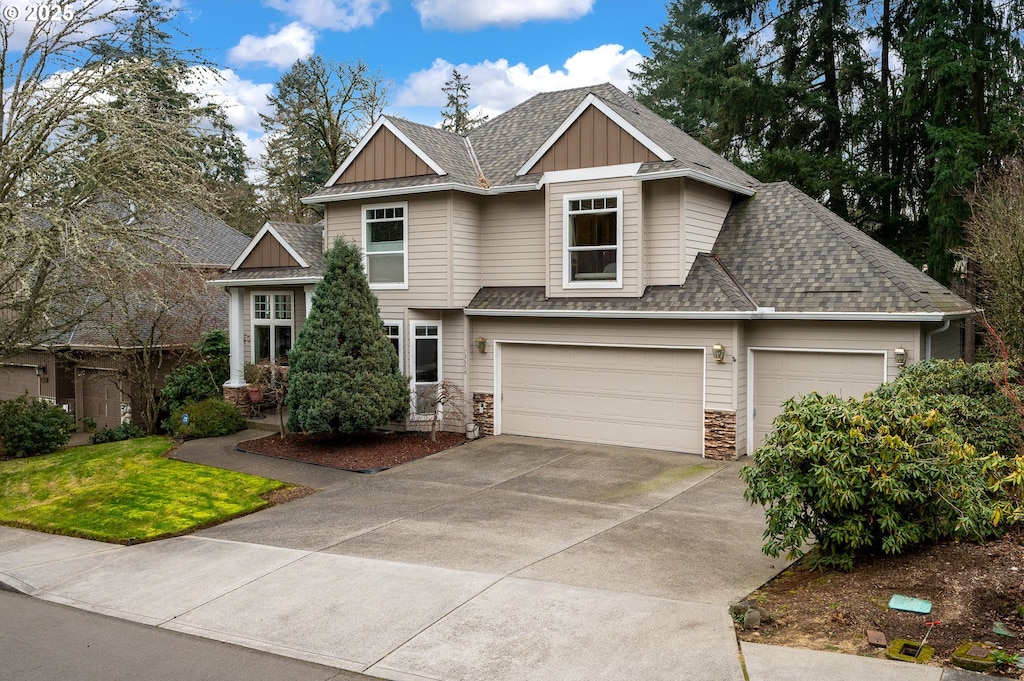 craftsman-style home with a garage