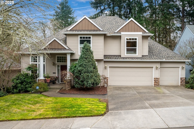 craftsman-style home with a garage and a front yard