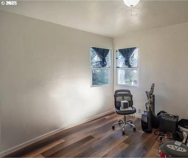 office featuring wood finished floors and baseboards