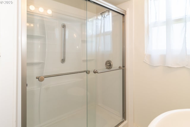 bathroom featuring a stall shower