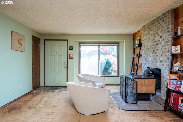 1363 SE 135th Ave, Portland, OR 97233 - carpeted living room with a wood stove and a textured ceiling