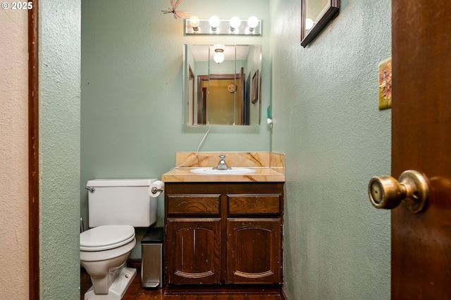 1363 SE 135th Ave, Portland, OR 97233 - half bath with toilet, vanity, and a textured wall