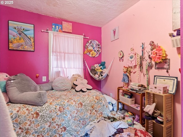 bedroom with a textured ceiling