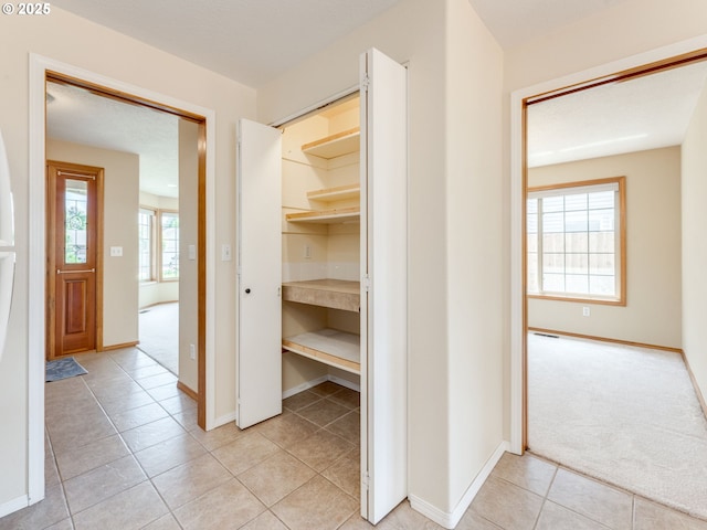651 SW Westview Dr, Mcminnville, OR 97128 - corridor featuring light tile patterned floors and baseboards