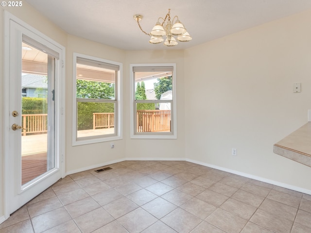 651 SW Westview Dr, Mcminnville, OR 97128 - unfurnished dining area featuring a chandelier and light tile patterned floors