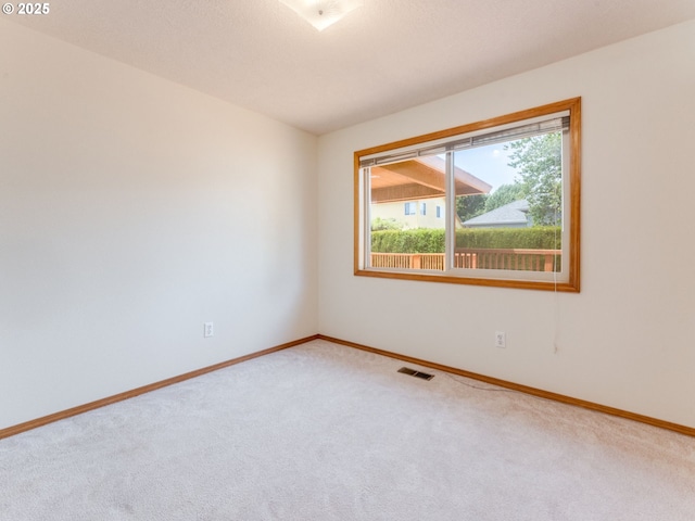651 SW Westview Dr, Mcminnville, OR 97128 - empty room featuring carpet floors and baseboards