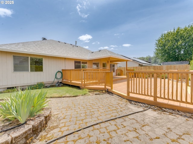 651 SW Westview Dr, Mcminnville, OR 97128 - rear view of property featuring a shingled roof, a deck, and a patio