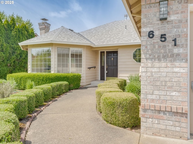 651 SW Westview Dr, Mcminnville, OR 97128 - entrance to property featuring a shingled roof and a chimney