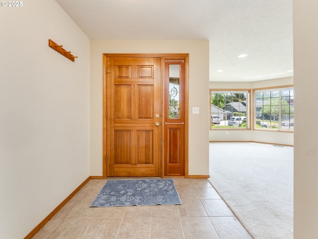 651 SW Westview Dr, Mcminnville, OR 97128 - foyer entrance with light tile patterned flooring, light carpet, and recessed lighting