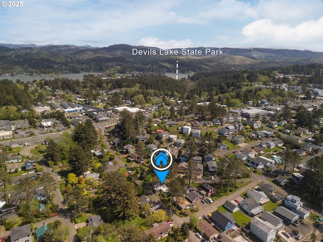 1844 NW 33rd St, Lincoln City, OR 97367 - aerial view of property's location featuring mountains, a forest, and nearby suburban area