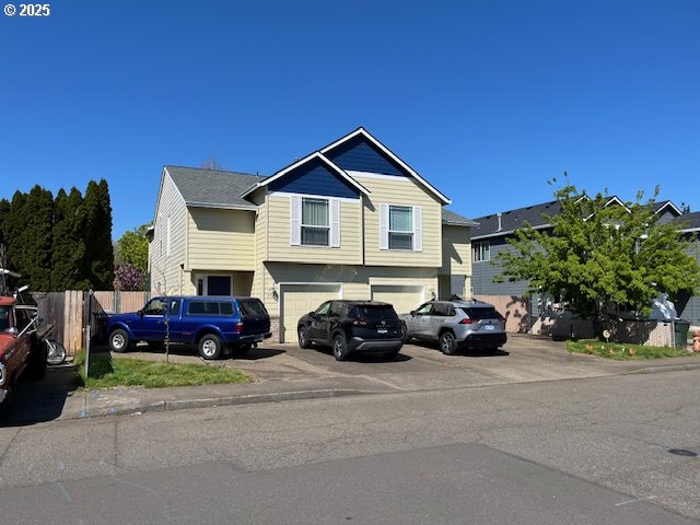 471 S Pine St, Canby, OR 97013 - view of front of home with driveway and an attached garage