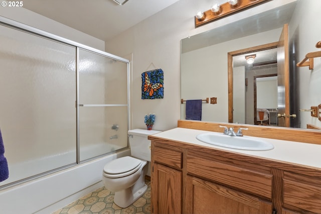 1430 NW 19th St, Gresham, OR 97030 - bathroom featuring vanity, bath / shower combo with glass door, and tile patterned flooring