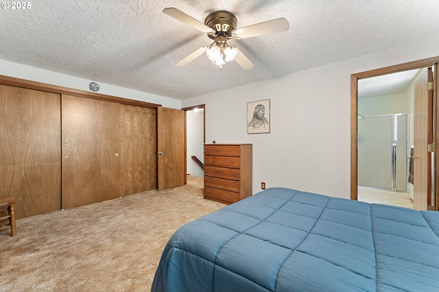 1430 NW 19th St, Gresham, OR 97030 - bedroom featuring a closet, light colored carpet, a textured ceiling, and a ceiling fan