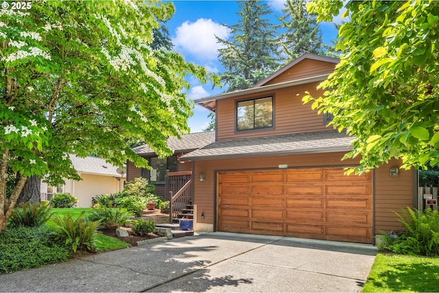 1430 NW 19th St, Gresham, OR 97030 - view of front of house featuring concrete driveway, an attached garage, and a shingled roof