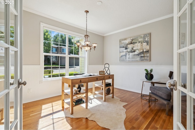 1365 NW 96th Ave, Portland, OR 97229 - dining room with a wainscoted wall, french doors, wood finished floors, an office area, and crown molding