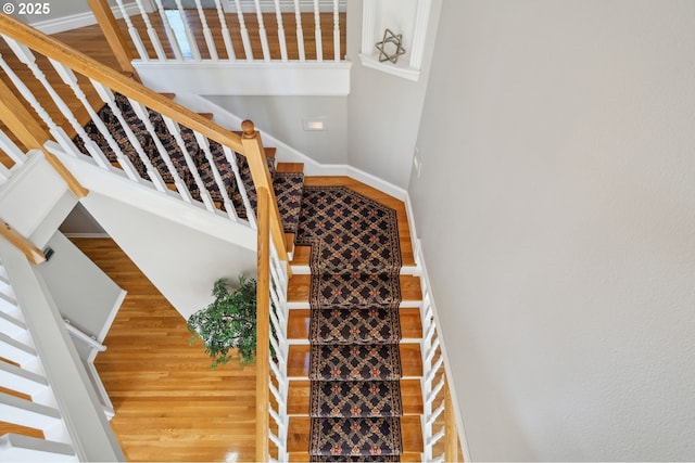 1365 NW 96th Ave, Portland, OR 97229 - stairway featuring wood finished floors and baseboards