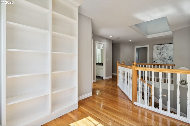 1365 NW 96th Ave, Portland, OR 97229 - hall with an upstairs landing, baseboards, wood finished floors, and attic access