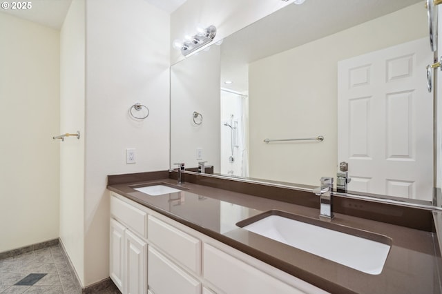 1365 NW 96th Ave, Portland, OR 97229 - bathroom with double vanity and baseboards