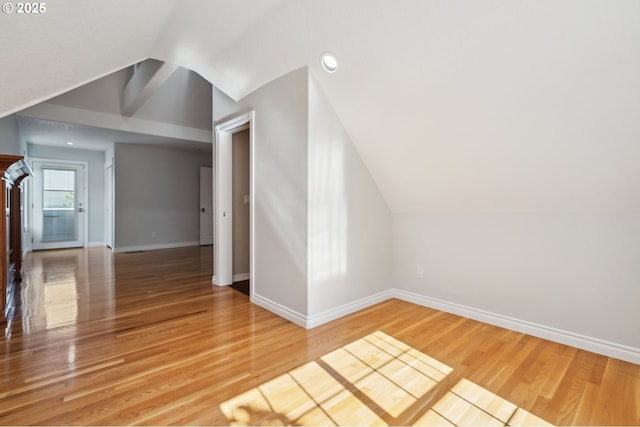 1365 NW 96th Ave, Portland, OR 97229 - additional living space with lofted ceiling, baseboards, and light wood-style flooring