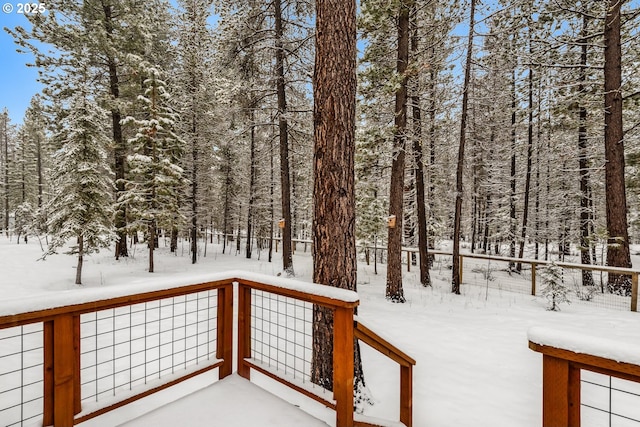 view of snow covered deck